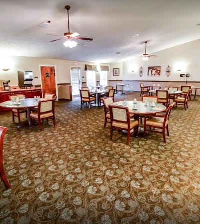 Interior dining area with tables and chairs