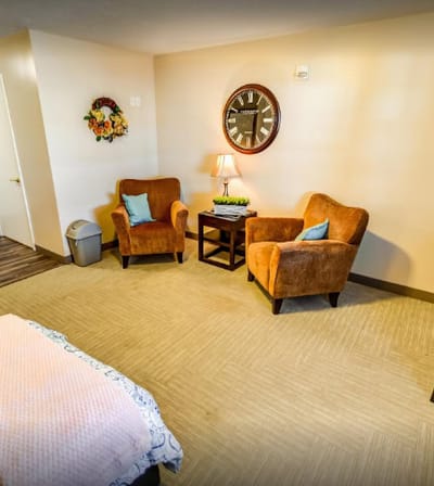 Cozy resident room with seating and decor