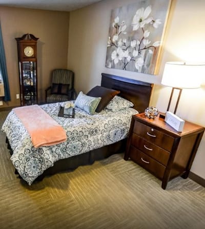 Cozy resident room with a bed and decor