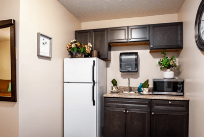 Modern kitchenette in a resident's room