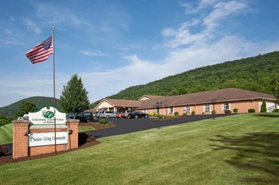 View of the senior living facility with landscaped lawn