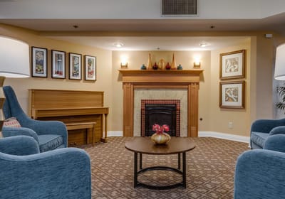 Cozy common area with seating and fireplace