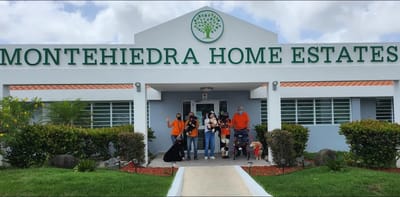 Entrance of Montehiedra Home Estates with staff and residents