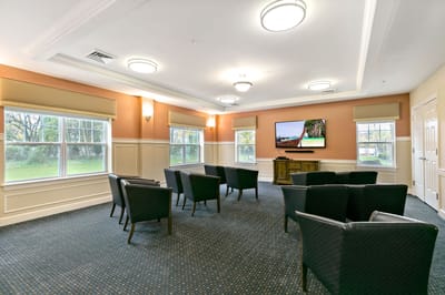 Common area with seating and a television