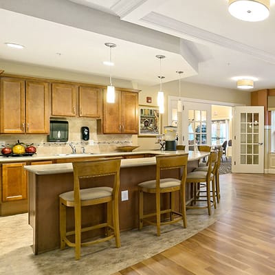 Bright, modern kitchen area in assisted living facility