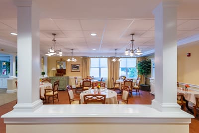 Interior dining area with tables and chairs