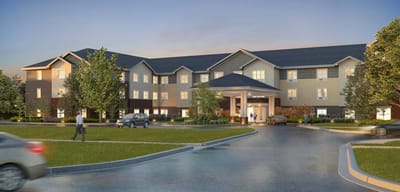Exterior view of Ashford of Grove City with landscaped entrance