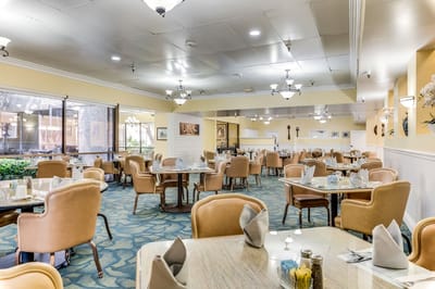 Dining area with tables set for meals