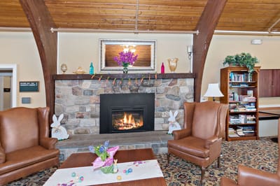 Cozy common area with a fireplace and seating