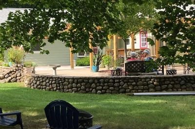 Residents enjoying the outdoor space in a garden area