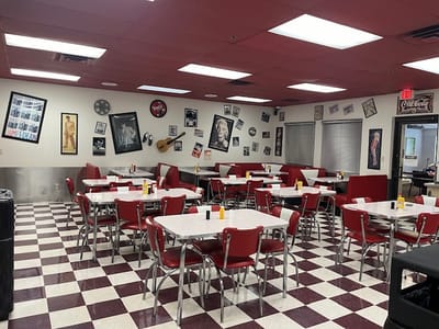 Bright dining area with retro decor and seating
