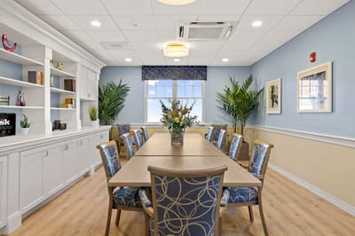 Bright and inviting common area with a large table