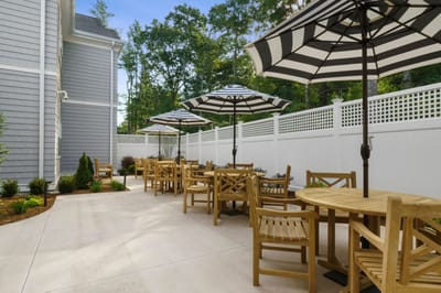 Outdoor seating area with umbrellas and tables