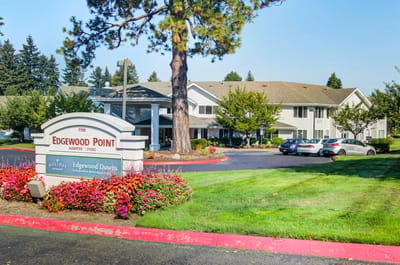 Exterior view of the main entrance sign and building at Edgewood Point