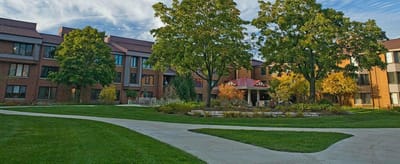 Exterior view of Encore Village with landscaped garden