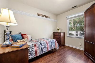 Cozy resident room with a bed and window