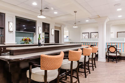 Interior view of a stylish common area with bar seating