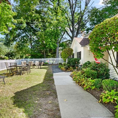 Well-maintained outdoor space with seating and greenery