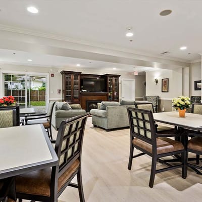 Bright common area with seating and plants