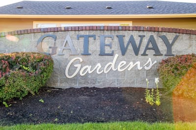 Gateway Gardens facility sign with landscaping