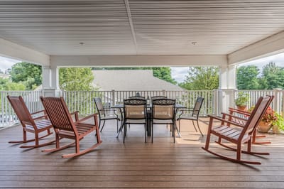 Outdoor seating area with rocking chairs