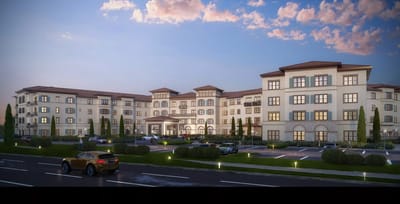 Exterior view of Grand Living at Tuscan Lakes at dusk