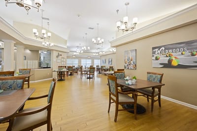 Bright dining room with tables and chairs