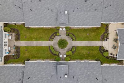 Aerial view of an outdoor courtyard with paths and landscaping