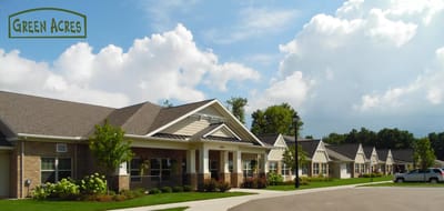 Facility logo with a backdrop of the building