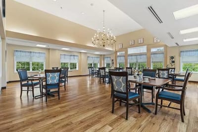 Bright dining room with tables and chairs