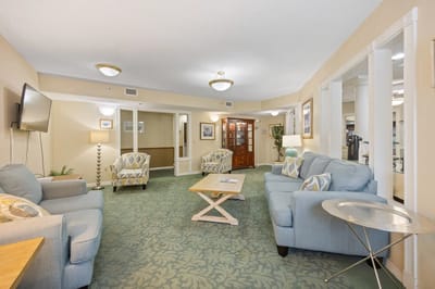 Bright common area with comfortable seating and decor