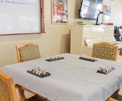A game table set up for residents in a common area