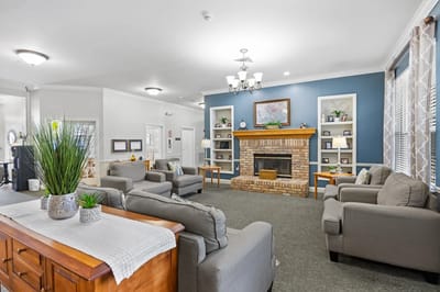 Cozy common area with comfortable seating and fireplace