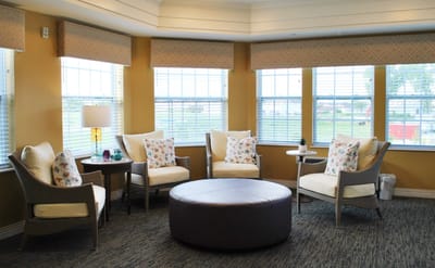 Cozy seating area in a common room with natural light