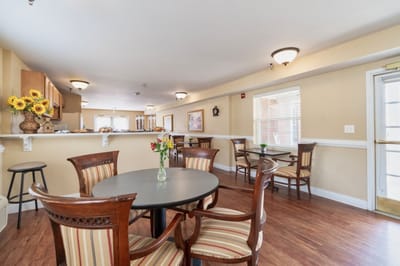 Bright dining room with tables and chairs