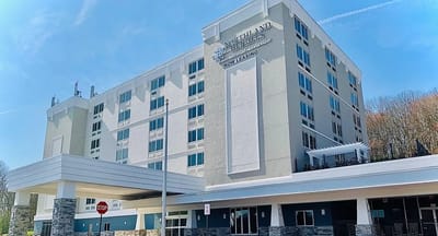 Exterior view of Northland Heights with blue sky