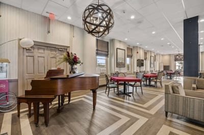 Interior common area with seating and piano