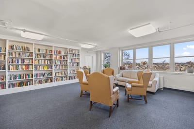 Interior view of a common area with bookshelves