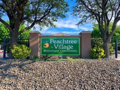 Exterior sign of Peachtree Village Retirement Community