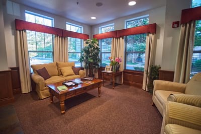 Cozy common area with comfortable seating and natural light