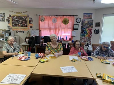Residents engaged in an arts and crafts activity