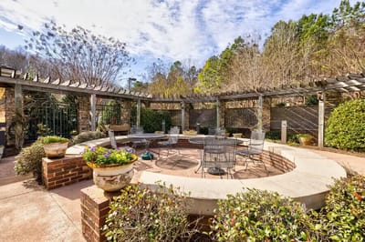 Outdoor seating area with landscaped surroundings