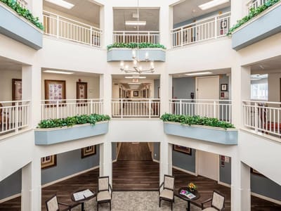 Bright interior common area with seating and decor