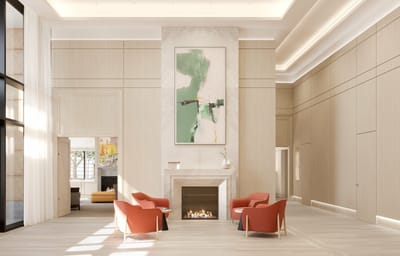 Bright and modern common area with seating and fireplace