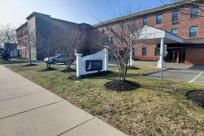 Entrance of The Parc at Harbor View with signage