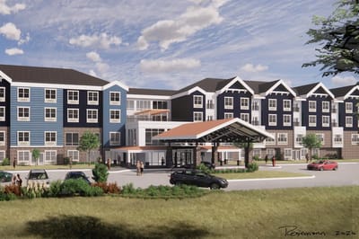 Exterior view of The Residence at Fitz Farm with landscaping and cars