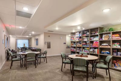 Bright activity room with games and tables