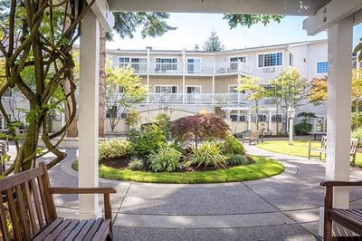 Outdoor garden area with seating and landscaping