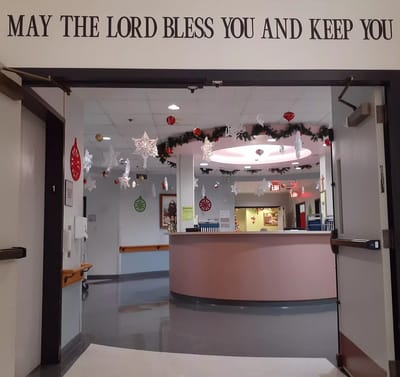 Interior view with seasonal decorations and welcoming sign