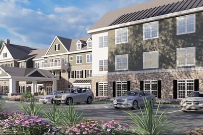 Exterior view of Arbor Terrace Exton with parking area